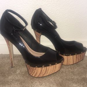 Shiny black faux wood platforms